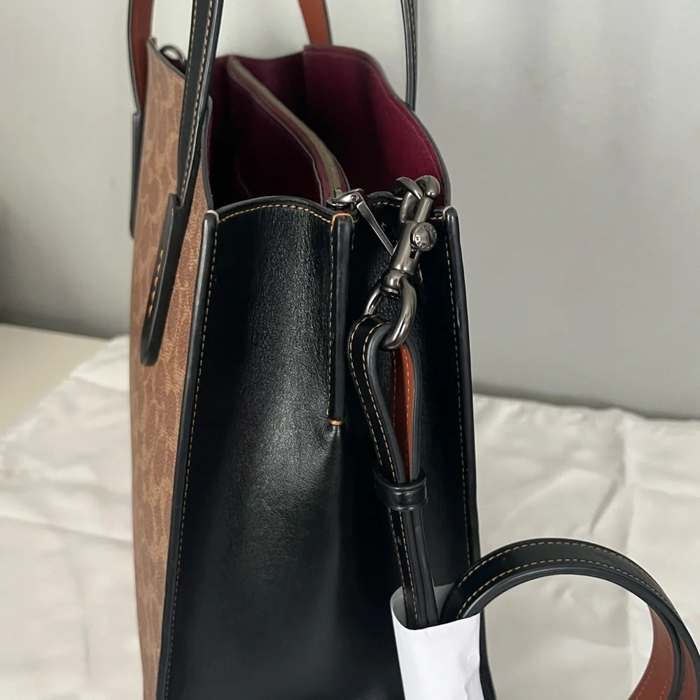 Disney X Coach Charlie Carryall
In Signature Canvas With Patches - Picture 9 of 15